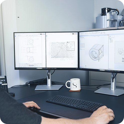 Designer creating blueprints on the computer